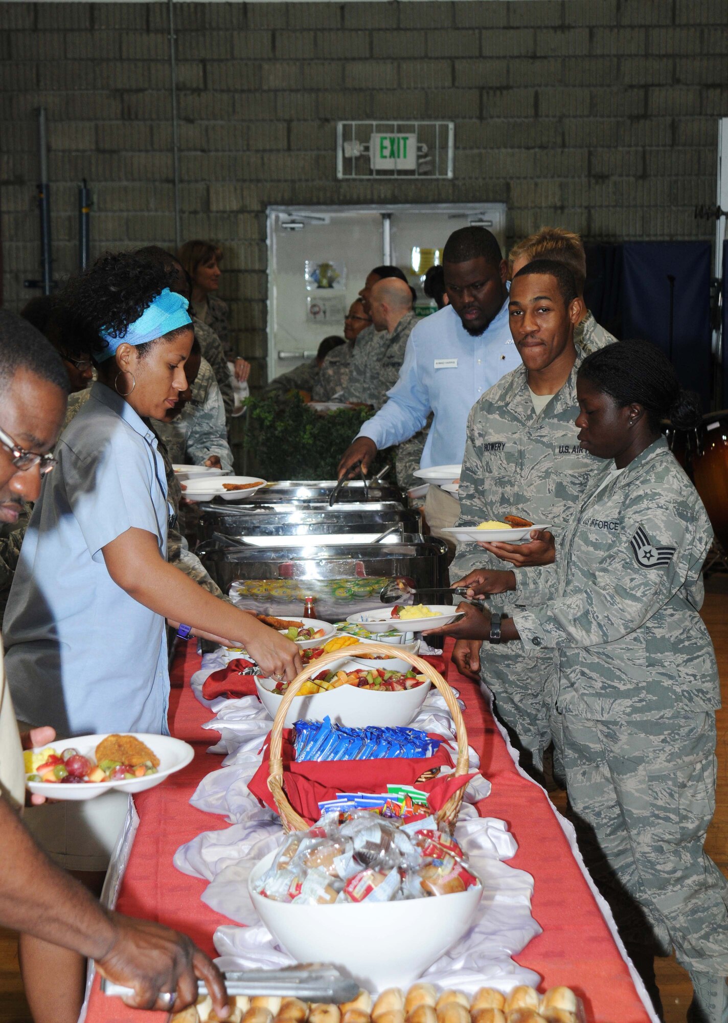 Airmen from the 379th Air Expeditionary Wing gather together for a Prayer Breakfast held by the 379 Chaplain Office May 10 in Southwest Asia.  The event offered food, prayer and live entertainment. (U.S. Air Force photo/ Staff Sgt. Anthony Graham)