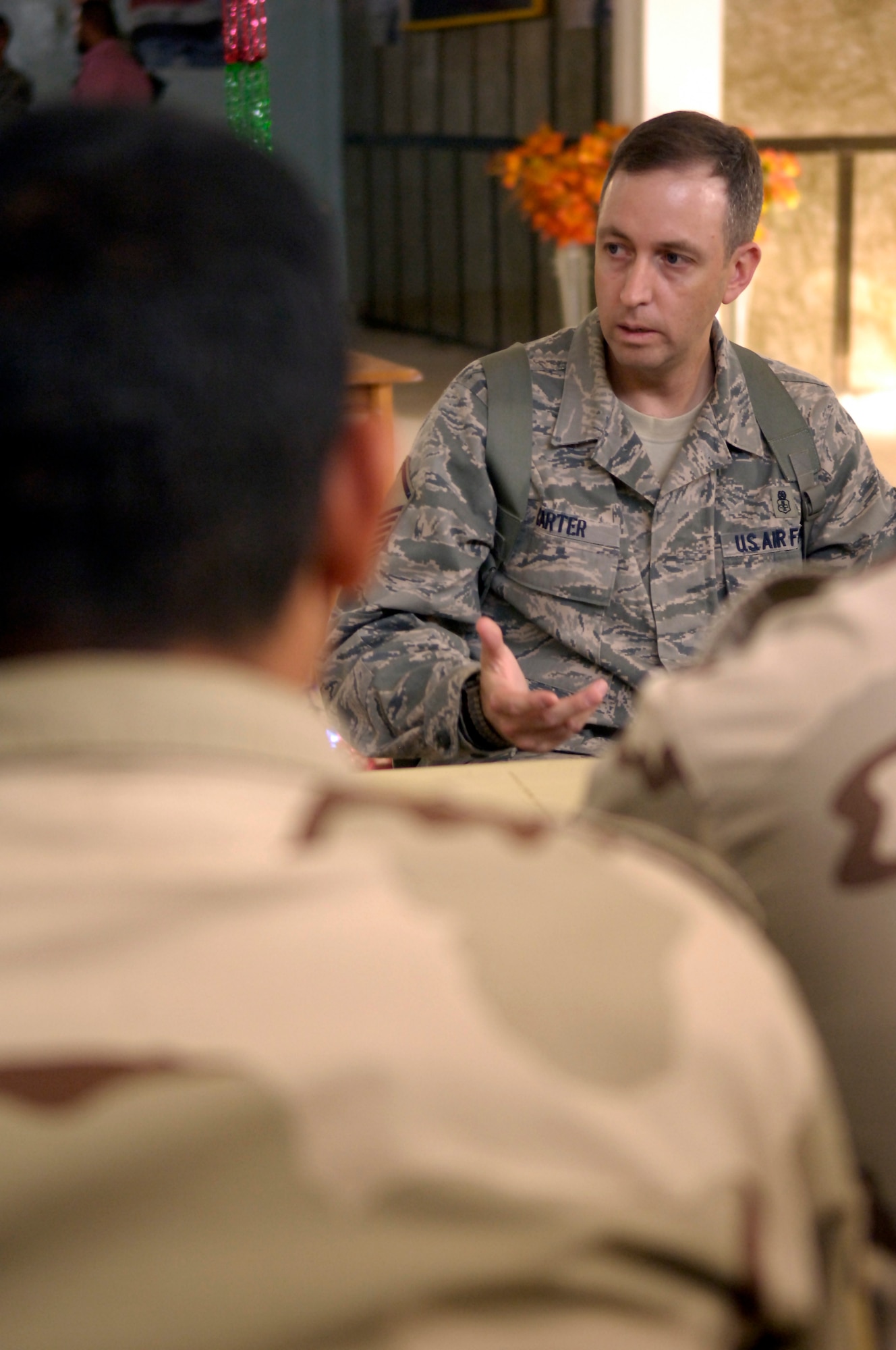 NEW AL MUTHANA AIR BASE, Iraq – Master. Sgt. Brian Carter, Iraq Training and Advisory Mission-Air medical advisor, discusses the Air Force core value of “Integrity First” with a group of junior Iraqi airmen during a non-commissioned officer professional development course April 27. U.S. Airmen with ITAM-Air and the 447th Air Expeditionary Group taught the course to help the IqAF develop its NCOs into stronger leaders. Sergeant Carter, originally from Wilson, N.C., is deployed from Seymour Johnson Air Force Base, N.C. (U.S. Air Force photo by Tech. Sgt. Randy Redman)
