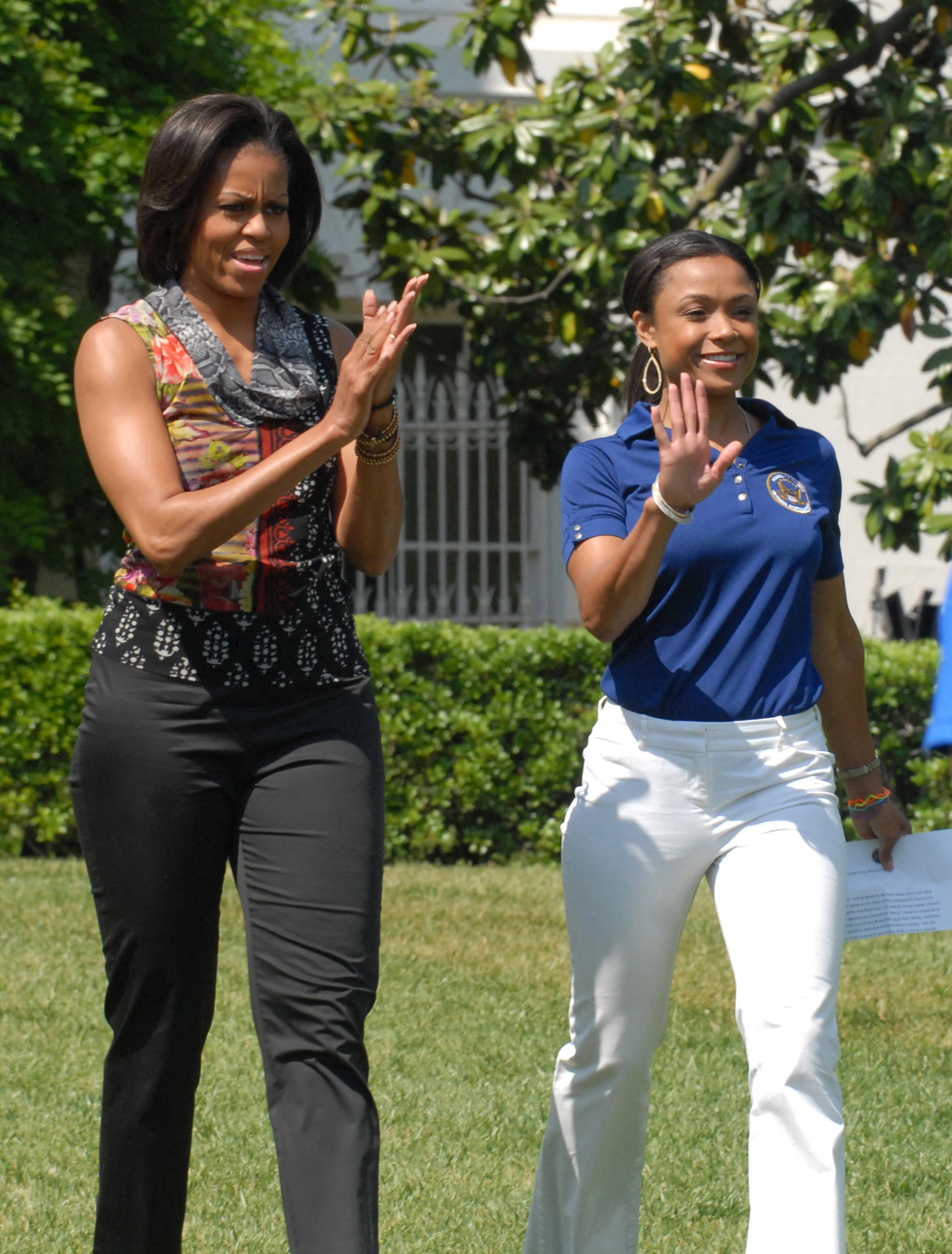 First Lady Michelle Obama and Olympic gold medalist Dominique Dawes ...