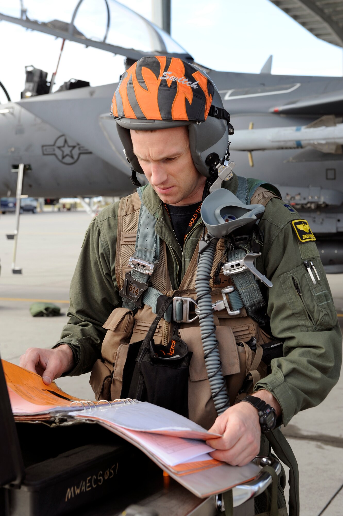 MOUNTAIN HOME AIR FORCE BASE, Idaho – Capt. Jeremy Putman, 391st Fighter Squadron, prepares for his first flight of the day May 10. Capt Putman had to fly in extra gear due to Phase II Operational Readiness exercise conditions.  (U.S. Air Force photo by Senior Airman Angelina Drake)