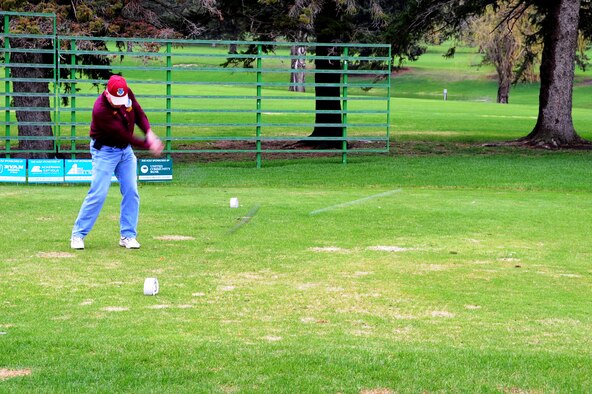 MINOT, N.D. -- Col. Fred Stoss, 91st Missile Wing commander, tees off during the Military Affairs Committee’s Golf Scramble at the Minot Country Club May 9. The Golf Scramble is an annual event designed to enhance community relations between base and civic leadership. (Air Force photo/Senior Airman Michael J. Veloz) 