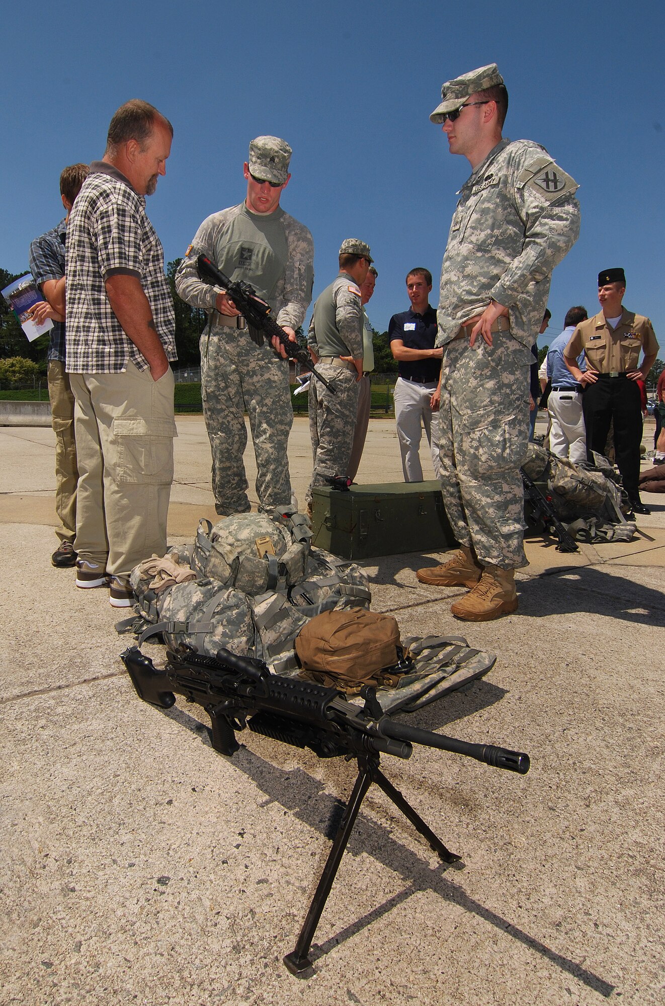 The Georgia National Guard set up a small arms display for students and parents to look over and get their hands on while attending Academy Day 2011 at Dobbins ARB, May 7.  (U.S. Air Force photo/ Brad Fallin)