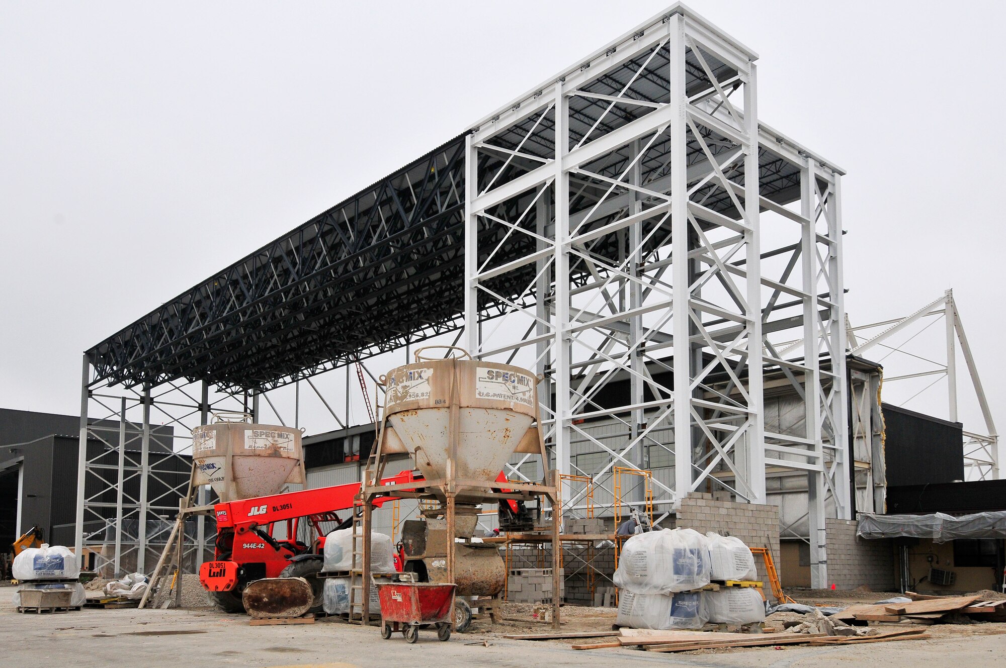 Contractors from KPH Construction, of Milwaukee, have made progress with an expansion of building 208, which is to become an aircraft hangar rather than an aircraft dock at the 128th Air Refueling Wing, Milwaukee Wisconsin 11 May 2011. Dual hangars will give a greatly increased capability to the 128th Air Refueling Wing's maintenance squadron and improve efficiency by 40 to 50%. The expansion project's current cost estimate is approximately $4 million. (US Air Force Photo by 2Lt Nathan Wallin)

