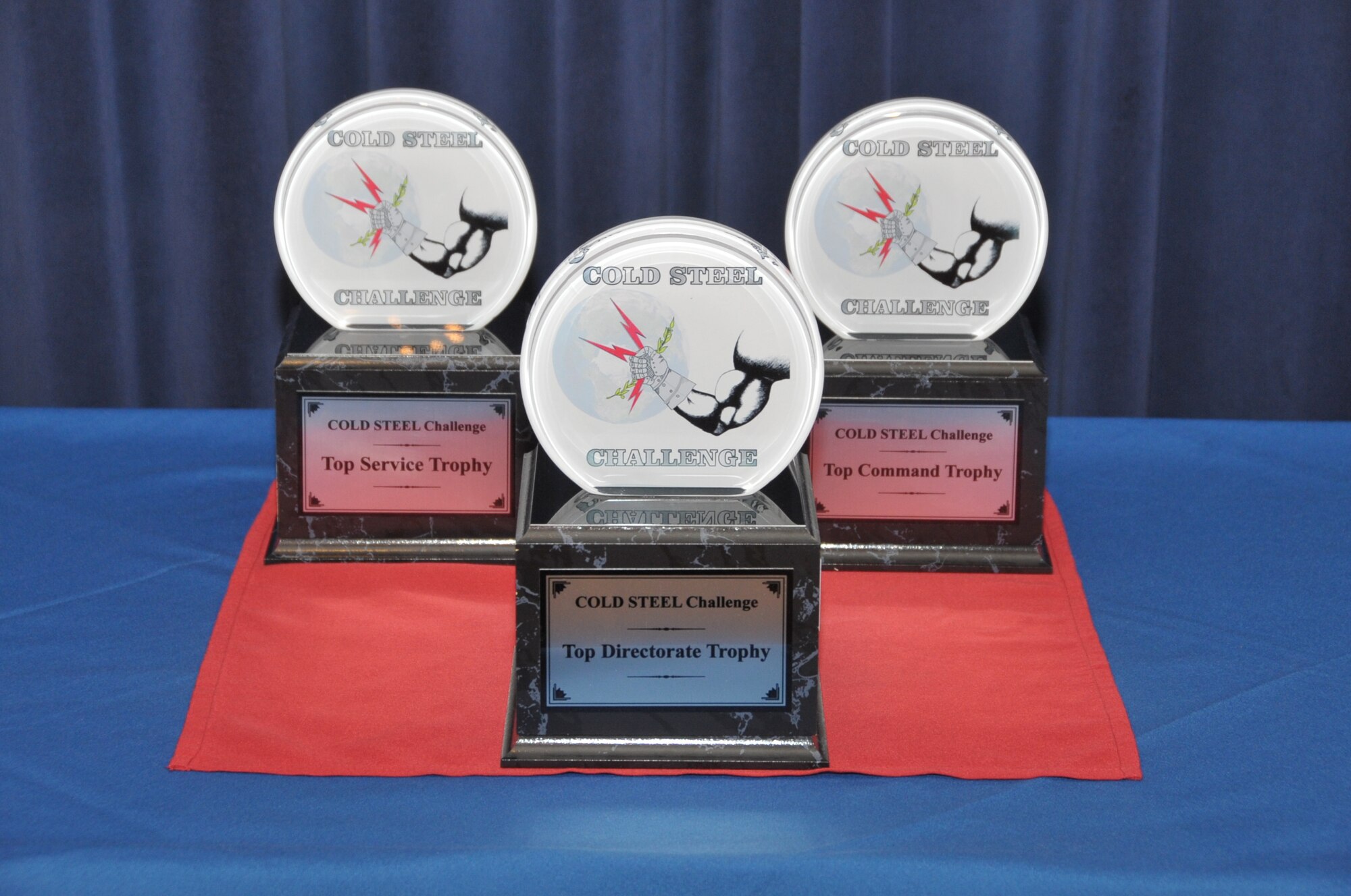 OFFUTT AIR FORCE BASE, Neb - Trophies for the Cold Steel Challenge sit together before they are handed out at a ceremony at the Patriot Club here, April 28. (U.S. Air Force photo by Dan Rohan)
