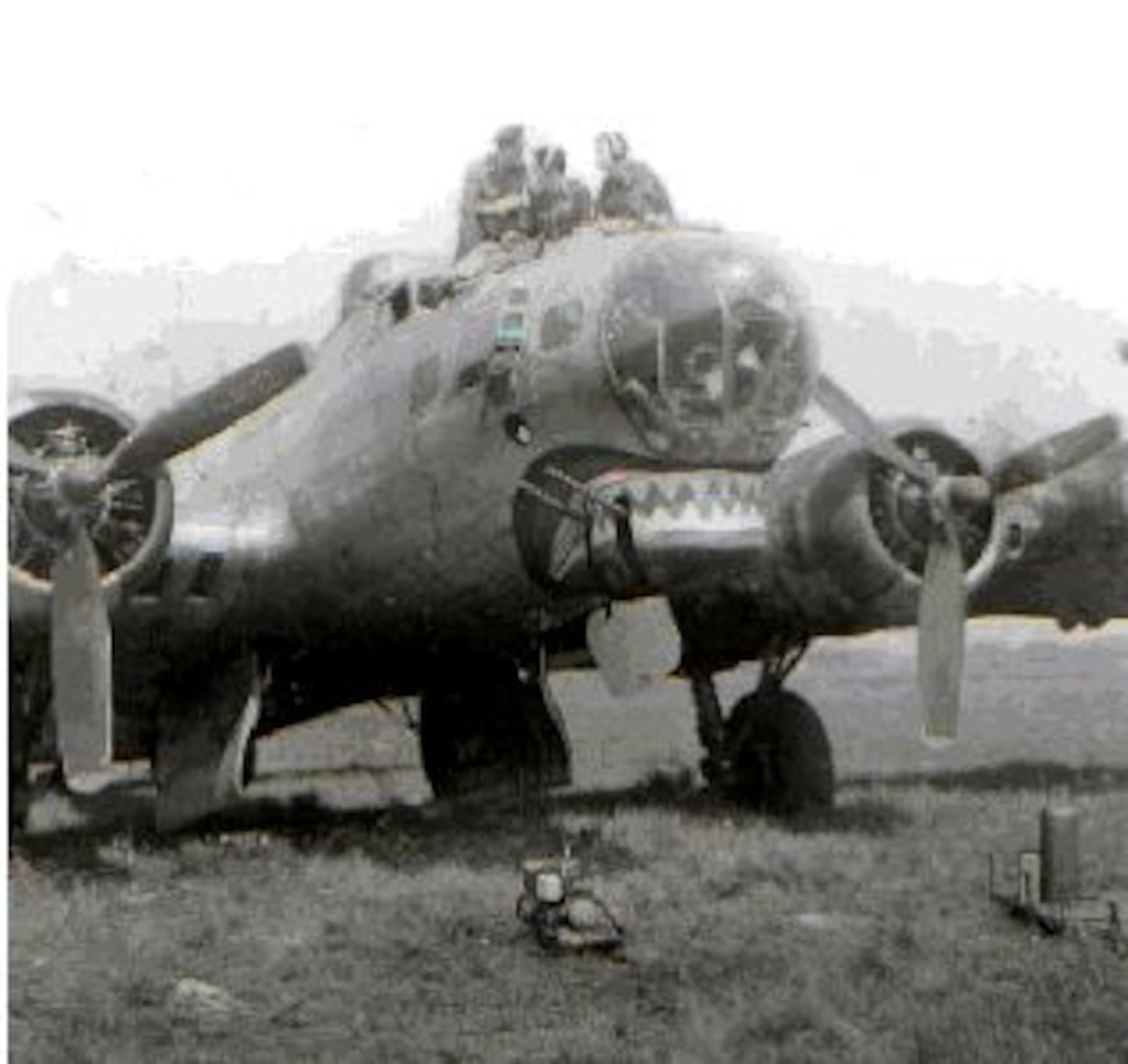 Charlie Hudson's B-17 served quite effectively to transport General Bill Gross, Commander of the 1st Combat Wingas well as war correspondents into Barth. During a three day period the plane was used as the "Control Tower" for flight operations in and out of the Barth Airport.  The Putt-Putt generator in the immediate foreground provided all of the electrical power that wa needed to keep the batteries charged and direct traffic in and out of the Barth airport using the command radio of Charlie's B-17. The "Tower" operators had an unobstructed view of all traffic as they sat perched on the nose of the aircraft. (Courtesy photo)