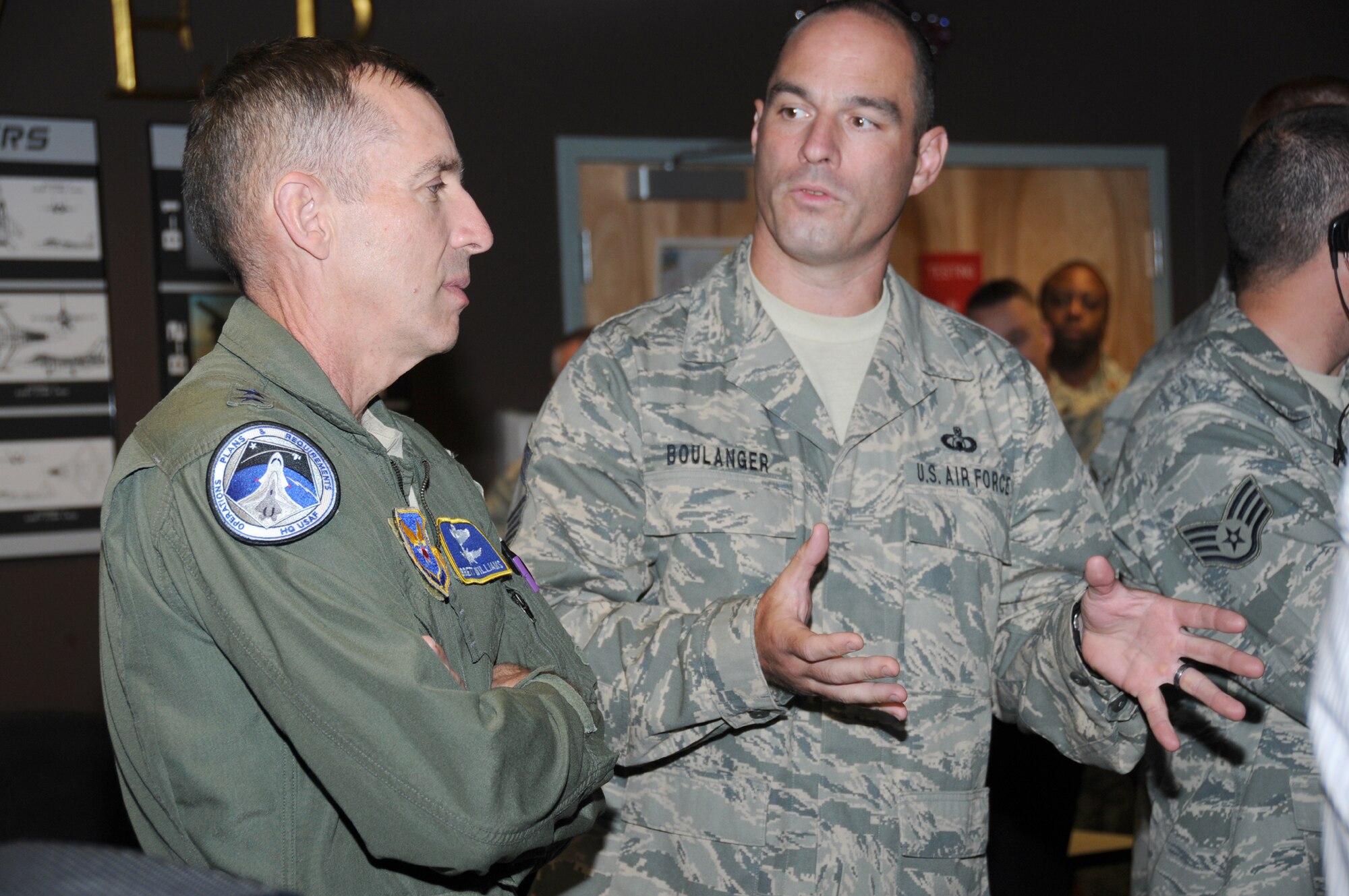 Maj. Gen. Brett Williams, left, talks with Chief Master Sgt. Richard Boulanger Jr.
during a May 5 tour of the 334th Training Squadron’s air traffic control simulator. The general is director of operations, deputy chief of staff for operations, plans and  requirements at Air Force headquarters at the Pentagon. The general was at Keesler for last week’s 2011 Airfield Operations Worldwide Conference.  (U.S. Air Force photo by Kemberly Groue)
