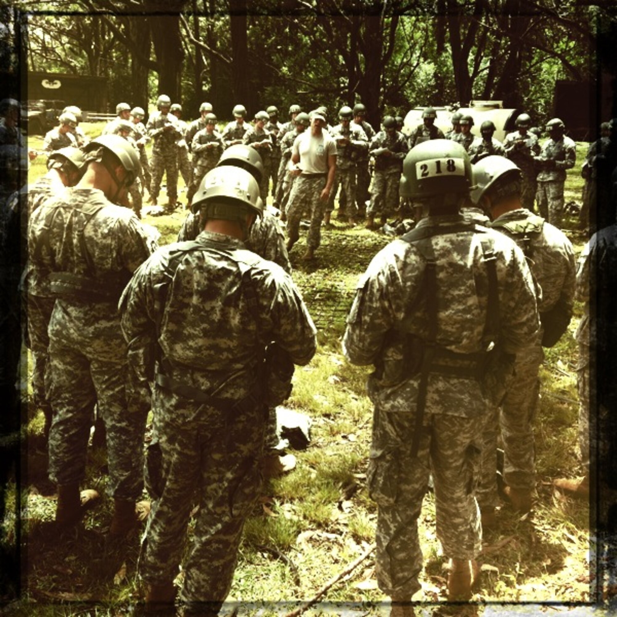 An instructor from the Warrior Training Center at Ft. Benning, Ga., teaches Airmen and Soldiers how to properly perform a sling load during the Air Assault course in Wahiawa, Hawaii, May 4. Five Pacific Air Forces 647th Security Forces Squadron Airmen were chosen to participate with 309 Soldiers in this intense, 11-day course April 30 to May 11, 2011. (U.S. Air Force photo/Staff Sgt. Carolyn Herrick)
