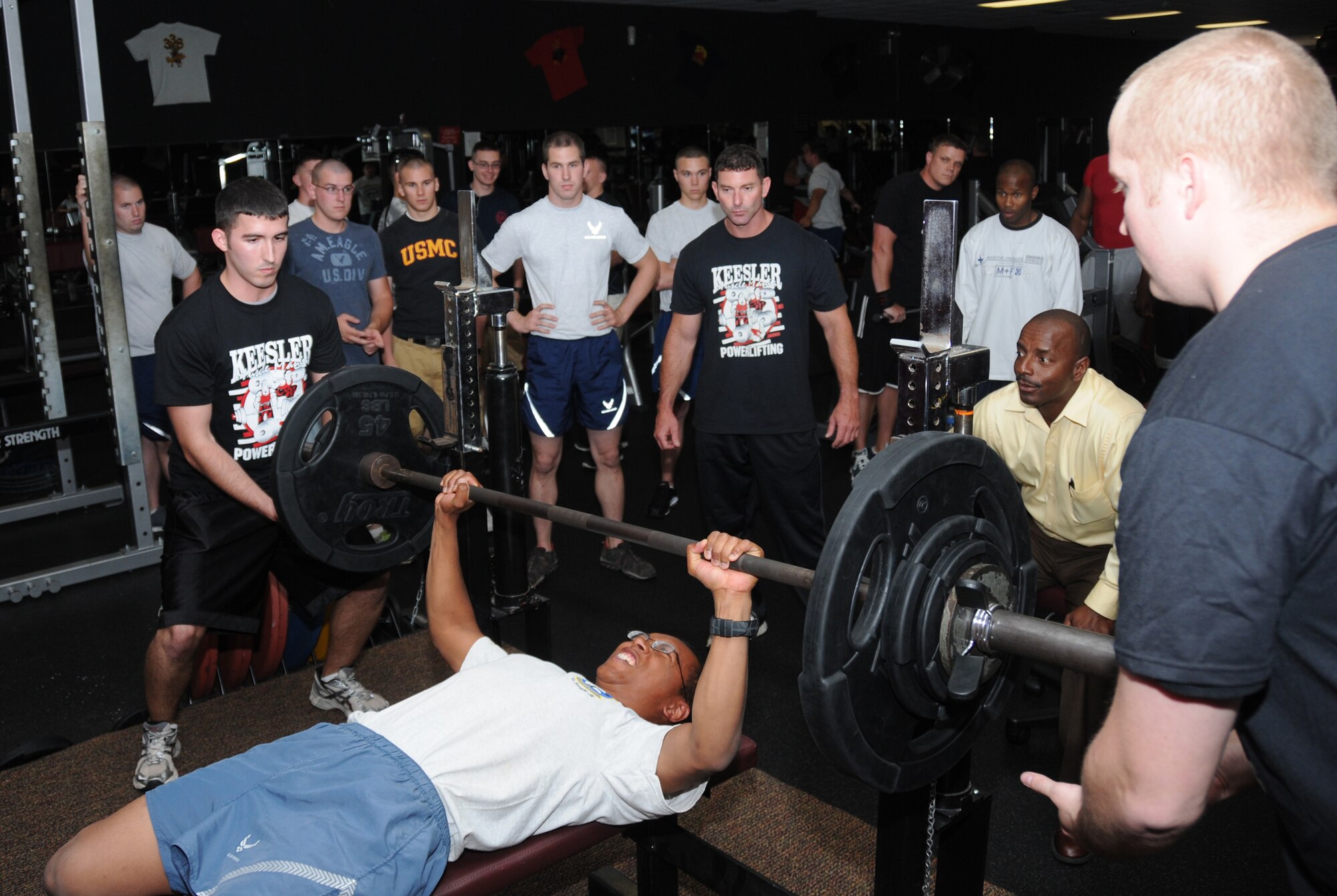 Thaddeus Faxon, 81st Contracting Squadron, digs deep and finds the strength to power through one more bench press repetition during the weightlifting competition
at the Triangle Fitness Center.   (U.S. Air Force photo by Kemberly Groue)
