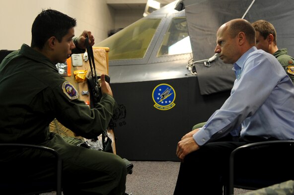WHITEMAN AIR FORCE BASE, Mo. - Senior Airman Estiven Gonzales, 509th Operations Support Squadron, demonstrates B-2 life support equipment to Assistant Secretary of Defense Andrew Weber during his visit to Whiteman AFB. Sec. Weber met with Whiteman Airmen to observe their stewardship of the nation's nuclear deterrent. (U.S. Air Force photo by Senior Airman Kenny Holston) 