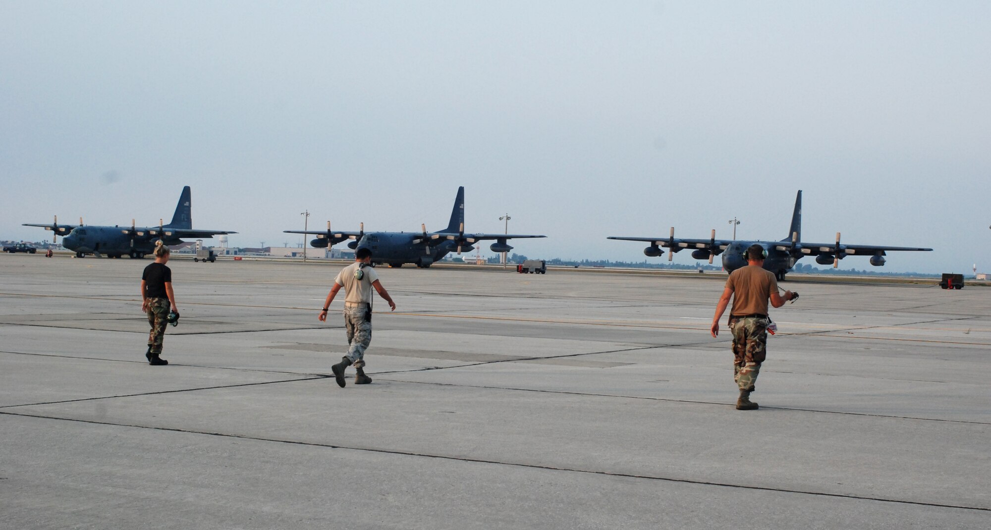 PATRICK AIR FORCE BASE, Fla. - Reservists from the 920th Rescue Wing's Maintenance Squadron perform a Foreign Object Debris walk on the flight line, Wednesday, to remove potentially hazardous objects before they cause damage to the aircraft. FOD walks are a permanent part of the maintenance schedule and save millions of dollars in repair costs. (U.S. Air Force photo/Staff Sgt. Leslie Forshaw)