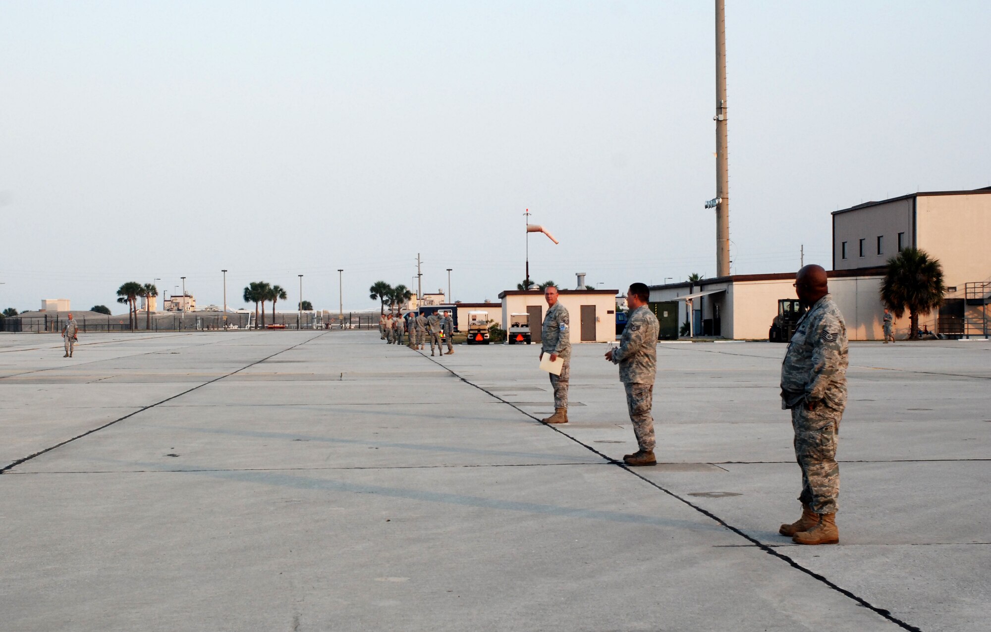 PATRICK AIR FORCE BASE, Fla. - Reservists from the 920th Rescue Wing's Maintenance Squadron perform a Foreign Object Debris walk on the flight line, Wednesday, to remove potentially hazardous objects before they cause damage to the aircraft. FOD walks are a permanent part of the maintenance schedule and save millions of dollars in repair costs. (U.S. Air Force photo/Staff Sgt. Leslie Forshaw)