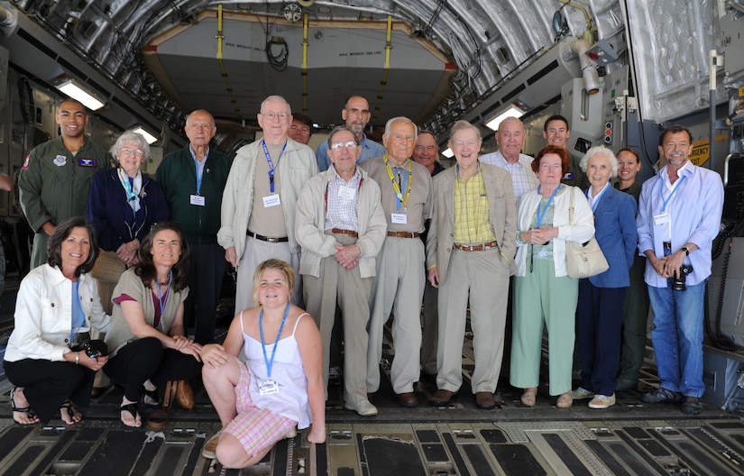 The World War II Hump pilots and members of the 15th Airlift Squadron take a group photo inside a static C-17 on Joint Base Charleston, May 5.  The World War II  Hump pilots  took a tour of Joint Base Charleston during their final reunion.  (U.S. Air Force photo/ Staff Sgt. Nicole Mickle)  