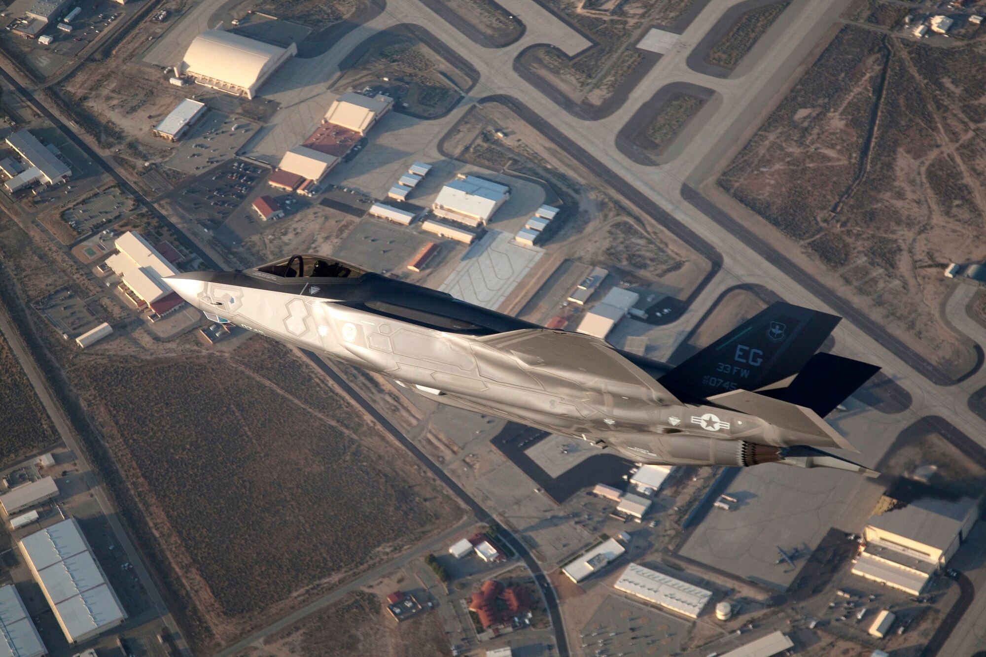 Edwards' newest F-35 Lightning II arrived for flight testing just before dusk, May 6. AF-07 is the first production-model F-35 delivered to the Air Force. (photo by Darin Russell, Lockheed Martin)