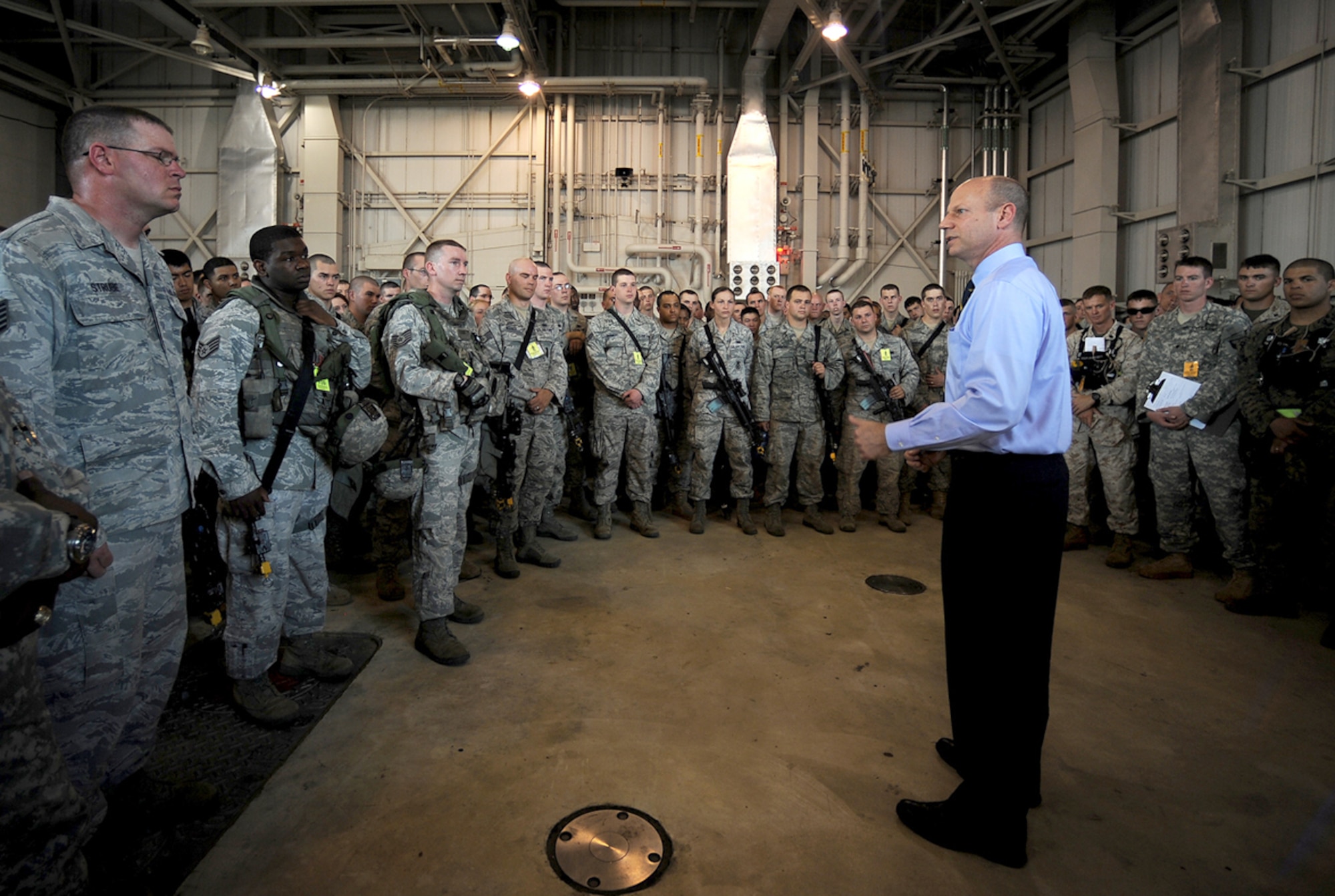 Assistant Secretary of Defense for Nuclear, Biological and Chemical Defense Programs Andrew Weber visited Whiteman Air Force Base, Mo., May 9, 2011. During his visit, he met with Airmen, received a B-2 Spirit mission orientation and watched a portion of a security forces exercise. (Courtesy photo)