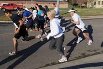 MINOT AIR FORCE BASE, N.D. -- Airmen take off running during a 5K run held at the McAdoo Fitness Center for the Triple Crown event here May 7. The Triple Crown event is a three part cardio tournament consisting of a 5K run on May 7, a 10K run on May 14 and a triathlon May 21. (U.S. Air Force photo/ Airman 1st Class Aaron-Forrest Wainwright)
