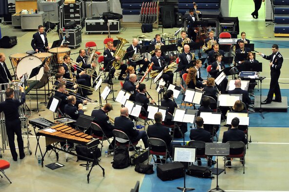 MINOT, N.D. -- The Heartland of America Air Force Band performs at the Minot Municipal Auditorium May 4. The vibrant ensemble presents exciting, uplifting music with innovation and professionalism inspiring patriotism to global audiences. (U.S. Air Force Photo/Senior Airman Lopez)