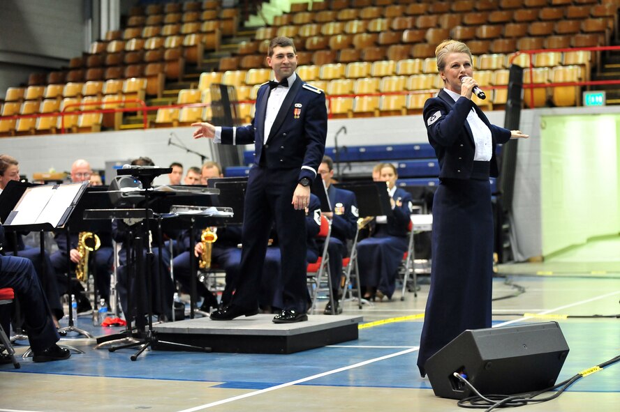 MINOT, N.D. -- Tech. Sgt. Lara Murdzia, and 2nd Lieutenant Daniel Boothe, members of the Heartland of America Air Force Band, perform at the Minot Municipal Auditorium May 4. The vibrant ensemble presents exciting, uplifting music with innovation and professionalism inspiring patriotism to global audiences. (U.S. Air Force Photo/Senior Airman Lopez)