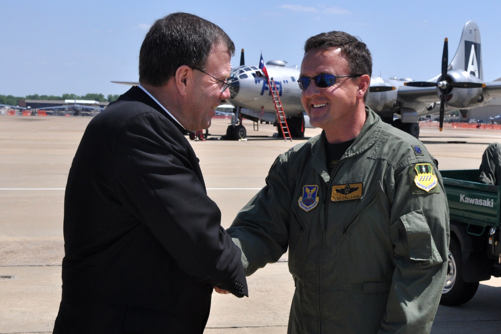Lt. Col. Todd Callahan, training officer, 11th Bomb Squadron, greets Bishop Neal J. Buckon, of the Archdiocese for the Military Services, USA, on the ramp at Barksdale Air Force Base, La., May 6, 2011. Bishop Buckon traveled from Washington, D.C., to celebrate Confirmation with the Holy Family Catholic Parish on base. He also visited with military clergy from Air Force Global Strike Command and the 2nd Bomb Wing while at Barksdale. During his time on the ramp, Bishop Buckon was able to witness several acts that were practicing for the Defenders of Liberty 2011 Air Show. (U.S. Air Force photo/Tech. Sgt. Jeff Walston)  