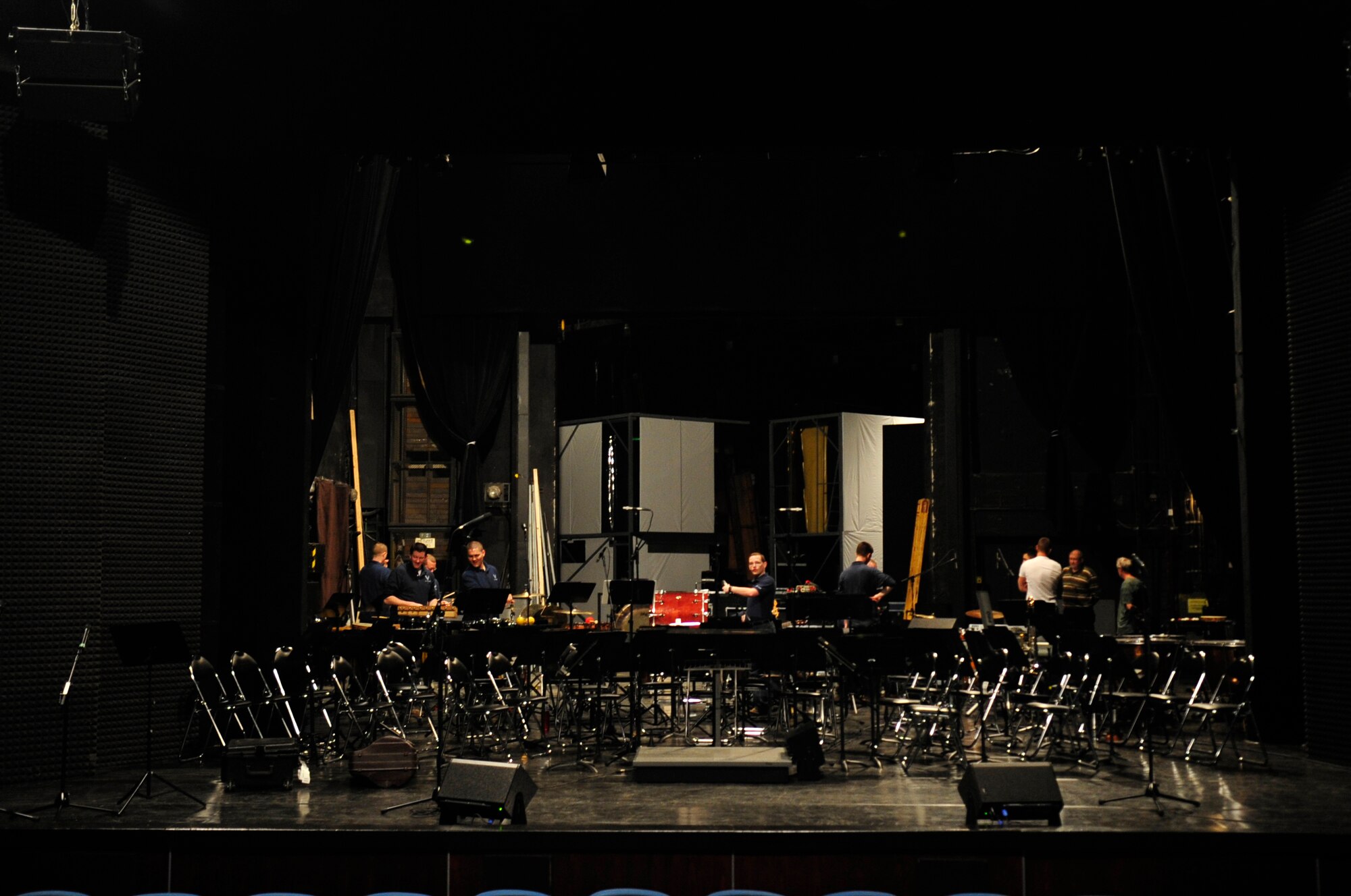 Members of the United States Air Forces in Europe Band set up the stage before a performance, Bratislava, Slovakia, May 4, 2011. The USAFE concert band is on tour through three countries, performing at seven locations as part of a building partnerships capacity and community outreach initiative. (U.S. Air Force Photo by Tech Sgt. Jocelyn L. Rich)