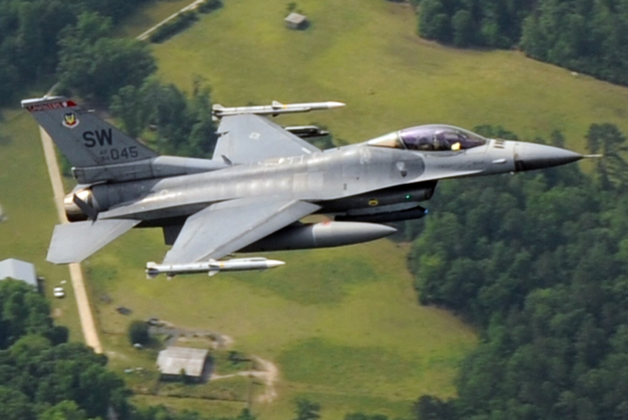 110506-F-TX124-011
SHAW AIR FORCE BASE, S.C. --  Captain Weston Killian, 77th Fighter Squadron weapons chief, flies an F-16  to McEntire Joint National Guard Base, S.C. May 6, 2011. Shaw's 20th Fighter Wing alert facility has guarded our East Coast since Sept. 11, 2001 through Nov. 15, 2003 and Aug. 1, 2006 through May 6, 2011. (U.S. Air Force photo/Tech. Sgt. Louis Rivers)
