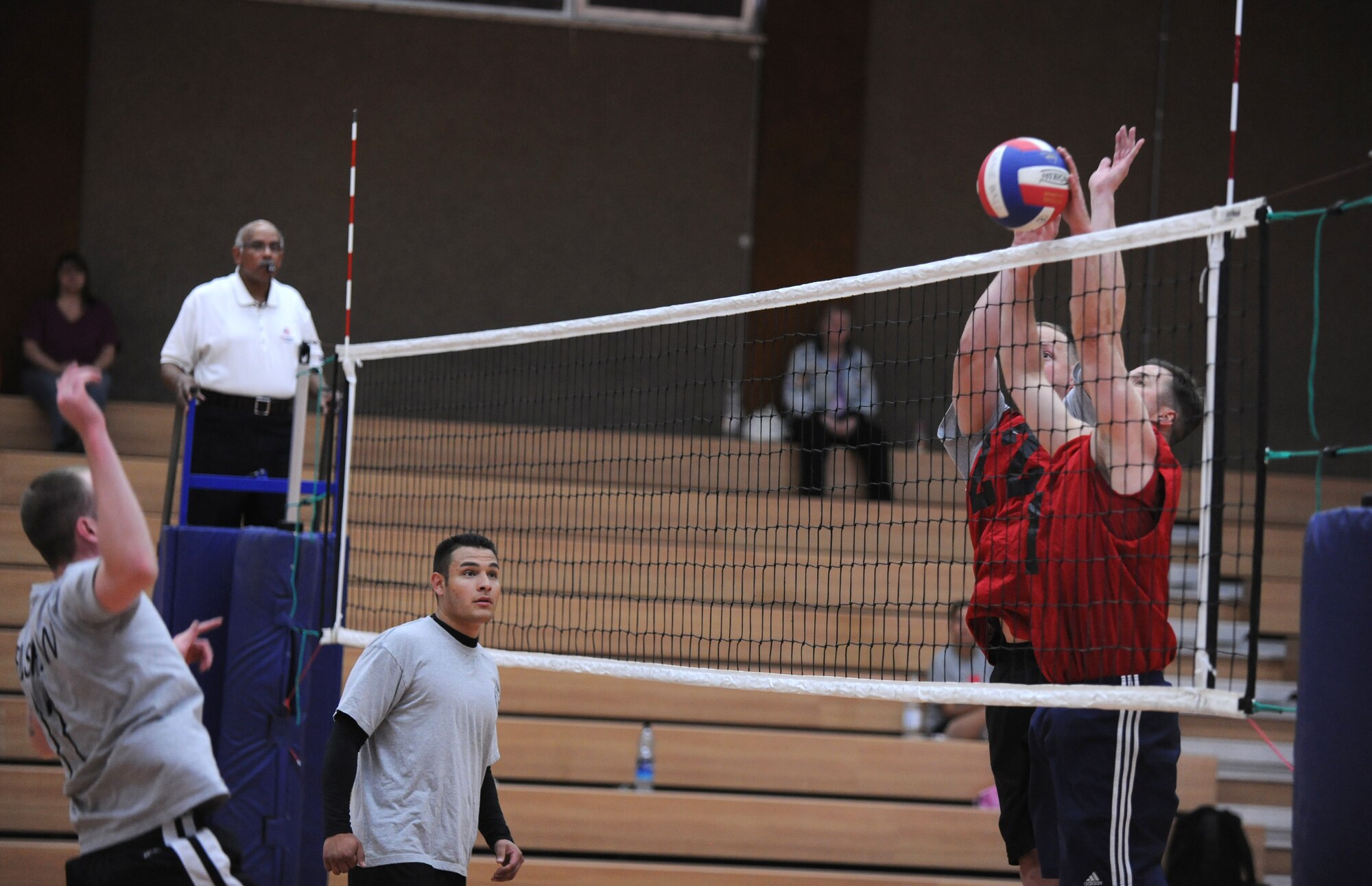 SPANGDAHLEM AIR BASE, Germany – 52nd Medical Group defenders block the ball during the intramural volleyball championship series here May 9. The 52nd Civil Engineer Squadron defeated MDG 25-16, 19-25, 15-10 to become the intramural volleyball champions. (U.S. Air Force photo/Senior Airman Nathanael Callon)