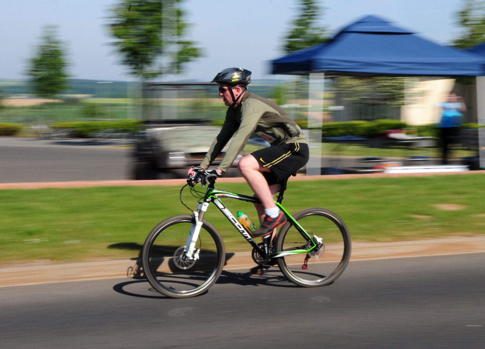 SPANGDAHLEM AIR BASE, Germany – Glenn Mitchell, 52nd Civil Engineering Squadron, begins the biking portion of the duathlon sponsored by the Skelton Memorial Fitness Center here May 7. The fitness center sponsored the event as part of National Physical Fitness and Sports Month. Kevin Toups, Air Force Office of Special Investigations, won the street bike division with a time of 1:32:11, and Mr. Mitchell, 52nd Civil Engineer Squadron, won the mountain bike division with a time of 1:41:31.( (U.S. Air Force photo/Airman 1st Class Matthew B. Fredericks)