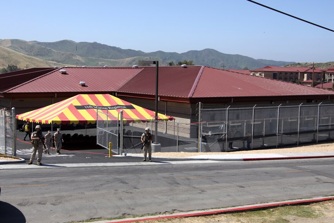 Camp Pendleton's 11th Marine Regiment unveiled their newly designed 28,912 square foot armory in Las Pulgas, May 11. The armory, which took nearly $7 million to complete, contains 16 artillery cages, a duty office, five working offices and a kitchenette. Separate from the building itself, are exterior weapons cleaning tables, which surround the armory on all sides. These structures contain lighting and built in equipment, which includes compressed air and power outlets.