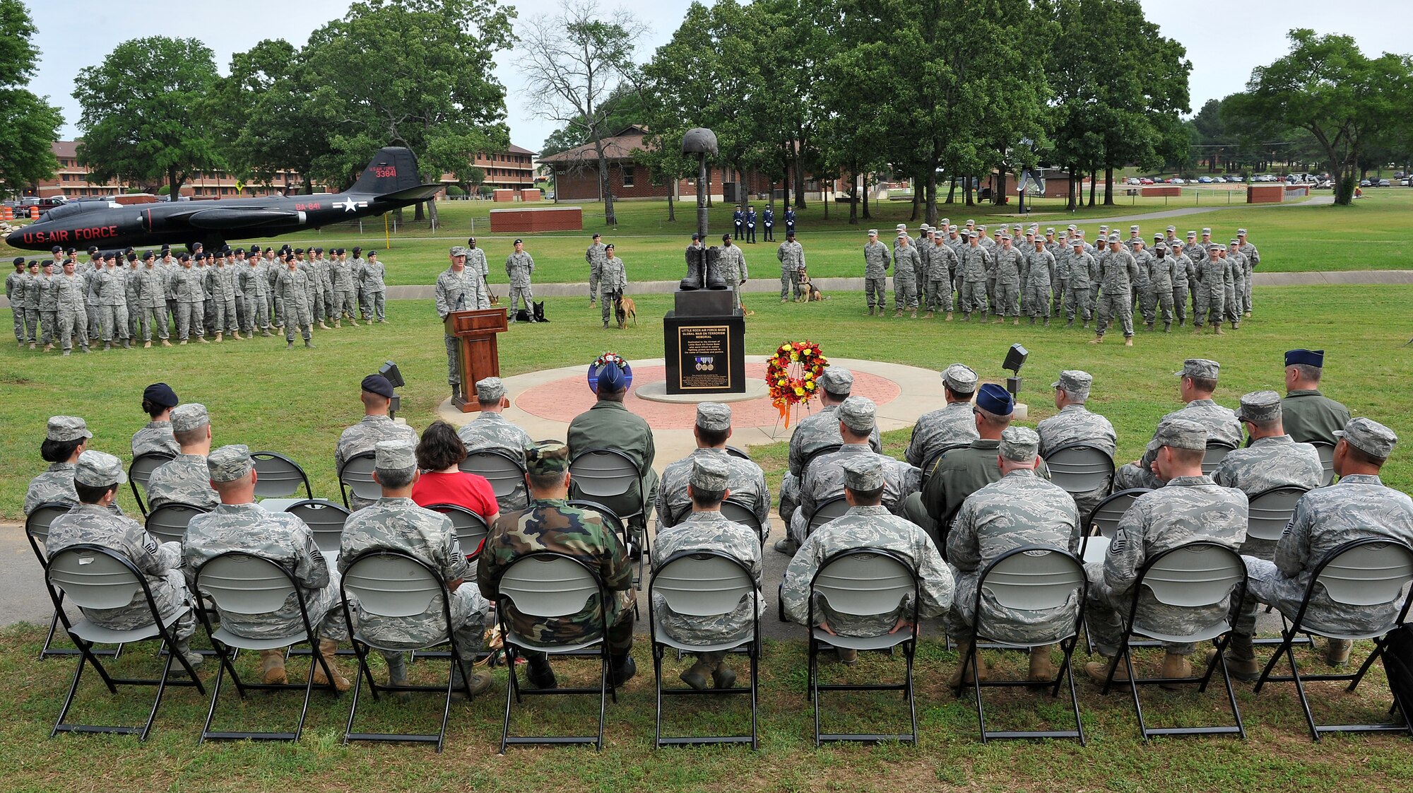 Members of Team Little Rock attend a wreath laying memorial service May 12, 2011, on Little Rock Air Force Base, Ark. Team Little Rock performs the ceremony every year to remember the two NCOs who gave their lives supporting Operation Iraqi Freedom. (U.S. Air Force photo/Staff Sgt. Chris Willis)