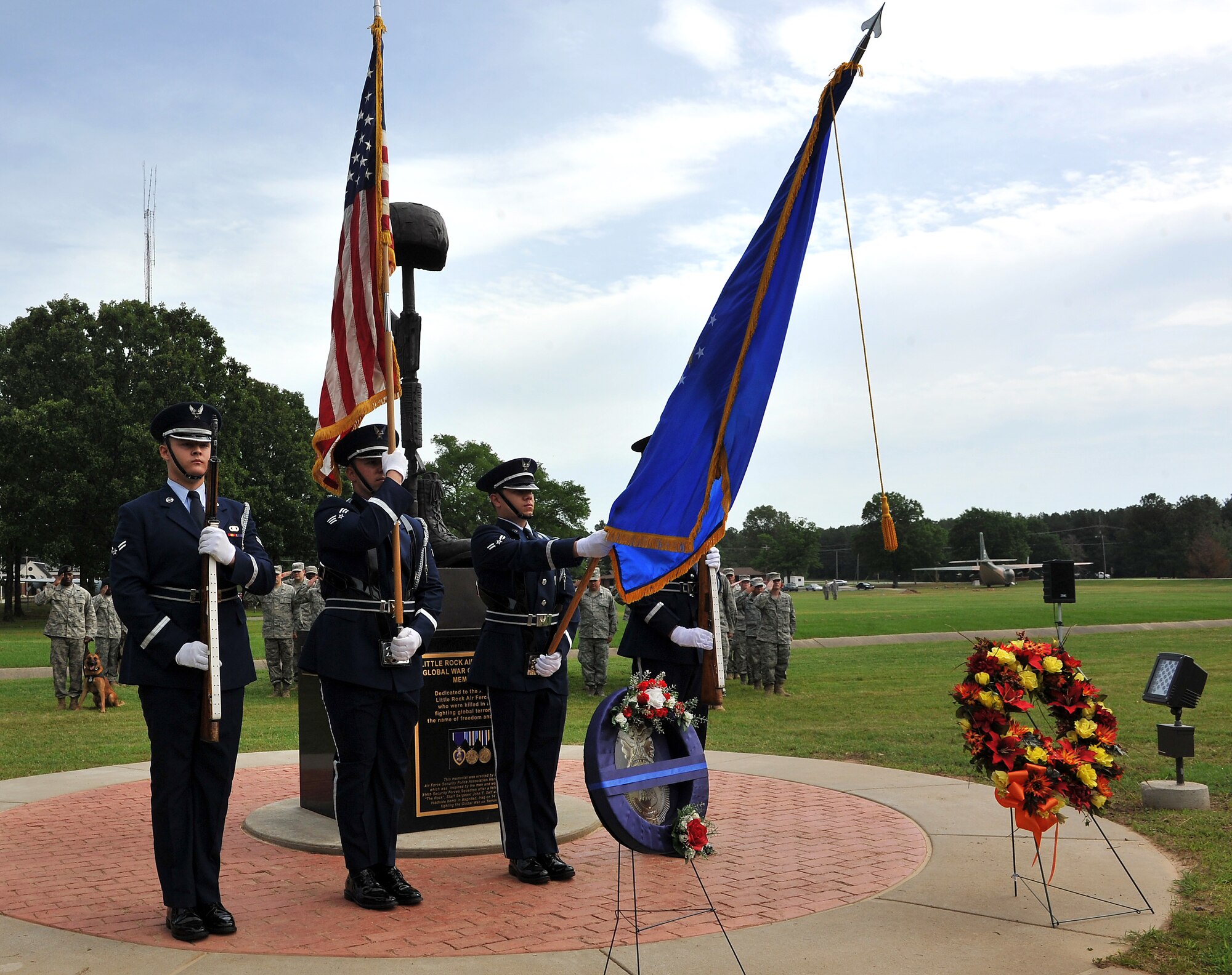 Members of the base honor guard post colors during a wreath laying memorial service May 12, 2011, on Little Rock Air Force Base, Ark. Team Little Rock performs the ceremony every year to remember the two NCOs who gave their lives supporting Operation Iraqi Freedom. (U.S. Air Force photo/Staff Sgt. Chris Willis)