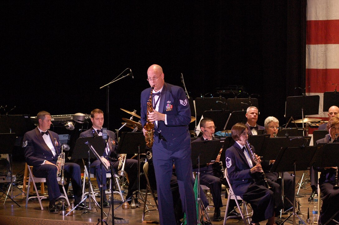 SSgt Rob Karns performs a saxophone solo with the Concert Band during Fiesta in Blue 2011.