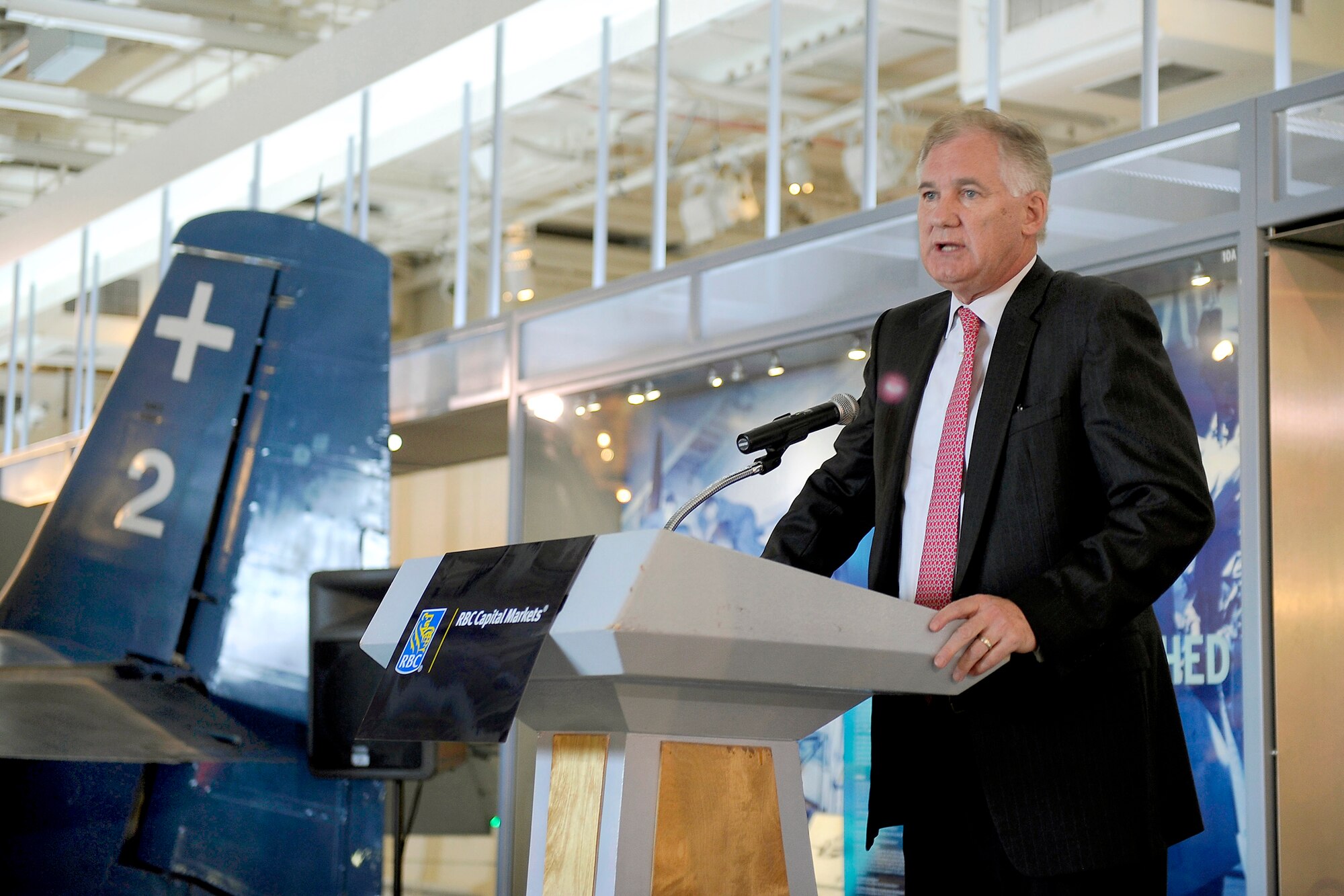 Deputy Defense Secretary William J. Lynn III addresses the audience at the Royal Bank of Canada Defense and Aerospace Conference in the hangar deck of the USS Intrepid Sea, Air and Space Museum May 11, 2011, in New York. (DOD photo/Terry Mitchell)