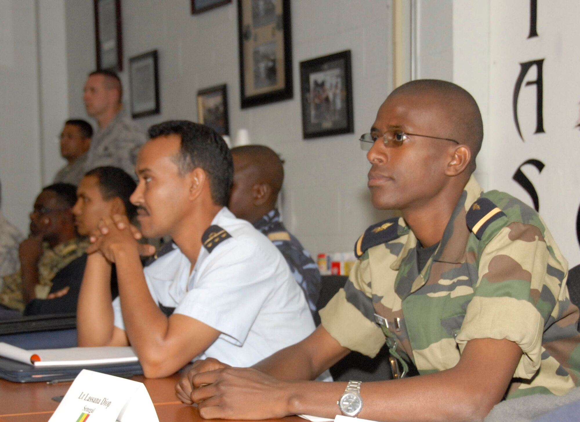 Lieutenant Lassana Diop from Senegal (right) and Capt. Neid Ould Nebghough from Mauritania (left), students in the Trans-Sahara Culture of Maintenance and Logistics Course, learn fundamental maintenance and logistics management skills May 5. The three-week course provides core elements such as aircraft and vehicle maintenance, logistics and safety. The course is a partnership course between the 17th Air Force (Air Forces Africa) and Air Education and Training Command and includes students from Chad, Mali, Mauritania, Morocco, Nigeria, Senegal and Tunisia. (U.S. Air Force photo/Danny Webb)