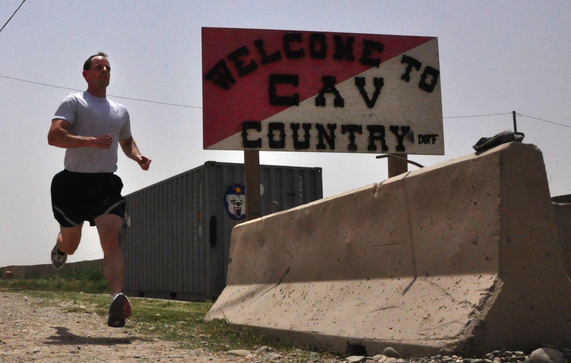 Staff Sgt. Joseph Ritter, 22nd Expeditionary Weather Squadron Detachment 3, runs sprints May 11, 2010, at Forward Operating Base Diamondback, Iraq, in preparation for a 13.1 mile race. The Plattsburg, Mo., native is training to run a half-marathon in Missoula, Mont. Sergeant Ritter is deployed from Eglin Air Force Base, Fla. (U.S. Air Force photo by Staff Sgt. R. Michael Longoria)