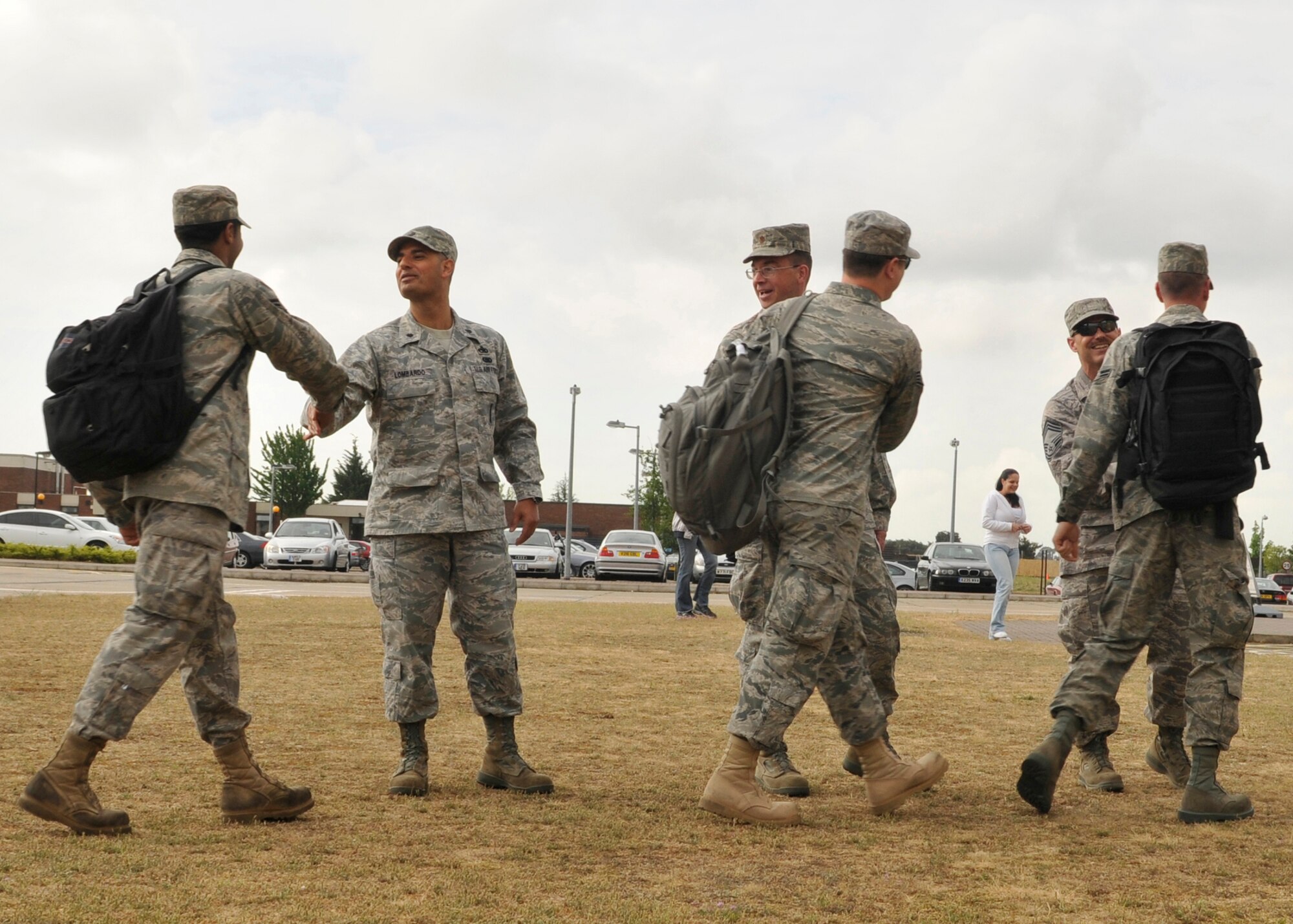 ROYAL AIR FORCE LAKENHEATH, England - Airmen from the 48th Aircraft Maintenance Squadron are welcomed back by leadership as they return to RAF Lakenheath from Aviano Air Base, Italy on May 11, 2011. The 48th AMXS Airmen were forward deployed to Aviano AB in support of Operation Odyssey Dawn and Operation Unified Protector. OUP is a NATO-led mission to operate a no-fly zone over the nation of Libya and provide humanitarian assistance to the Libyan civilian population in accordance with the United Nations Security Council resolution 1973. (U.S. Air Force photo/Senior Airman Tiffany M. Deuel)