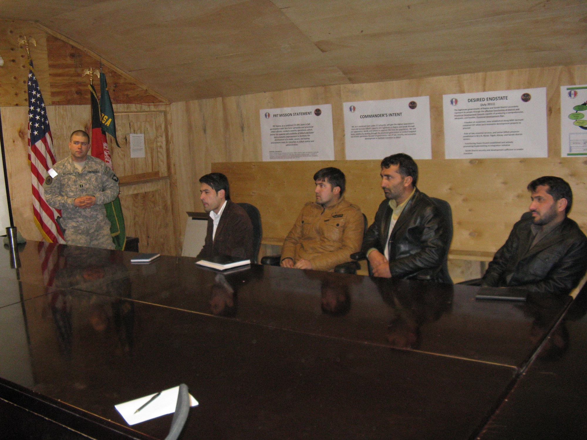 Capt. Brandon Rocker instructs local contractors how to properly submit bid packages for U.S. construction contracts. (Photo by Mr. Derrick Pace, U.S. Army Corps of Engineers representative for PRT Kapisa)