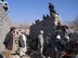 U.S. Air Force Capt. Brandon Rocker provides feedback regarding the construction of a perimeter wall to local construction workers in Kapisa, Afghanistan. ( U.S. Air Force photo/Master Sgt. Jonathan Estrada)