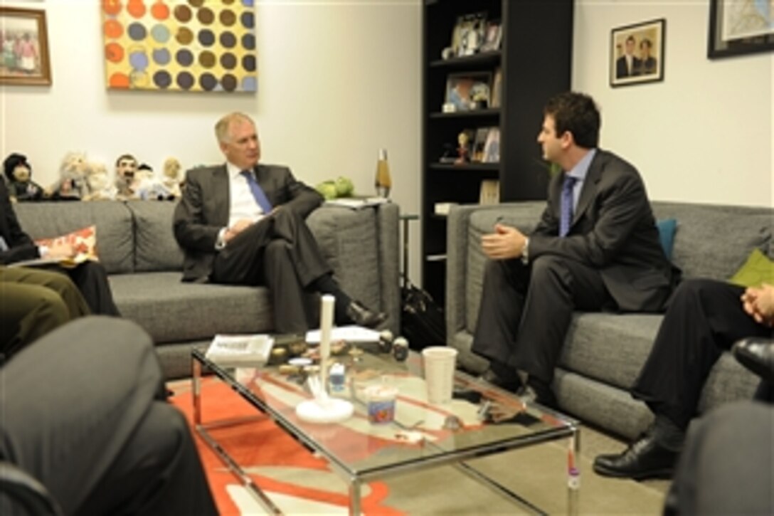 Deputy Secretary of Defense William J. Lynn III (left) talks to Google Ideas Director Jared Cohen and his team in New York City on May 12, 2011.  Lynn and Cohen discussed Google?s initiatives to apply technology solutions to problems faced by the developing world.  