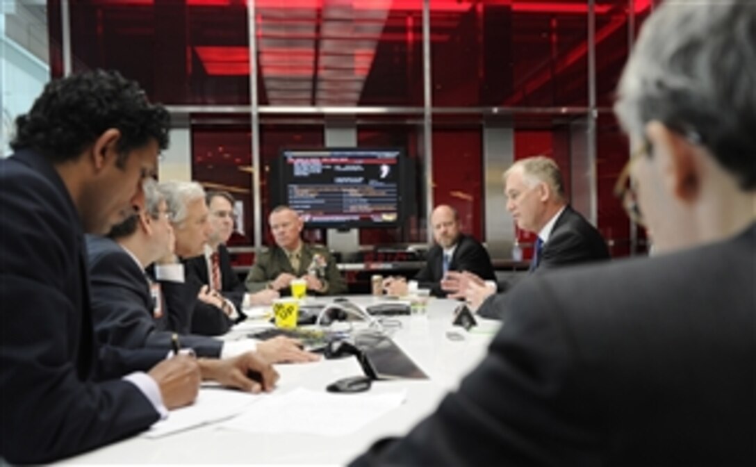 Deputy Secretary of Defense William J. Lynn III (2nd from right) is interviewed by Bloomberg News editors and reporters in New York, N.Y., on May 12, 2011.  Lynn earlier appeared on Bloomberg Television?s "In Business with Margaret Brennan," to discuss proposed cuts to defense spending and the impact on military operations.  