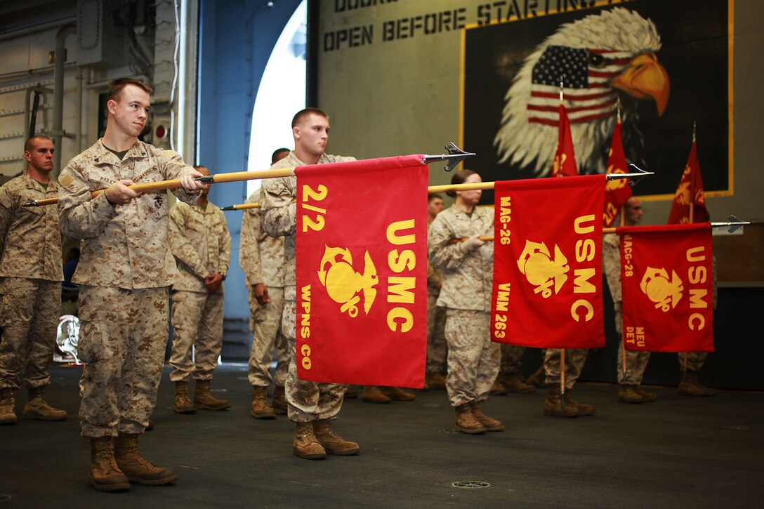 Marines with 22nd Marine Expeditionary Unit learn guidon flag close-order-drill commands and techniques during a two-week Corporal’s Course, May 12, 2011, aboard USS Bataan in the Mediterranean Sea.  The Marine Corps uses professional military education programs, like the Corporal’s Course, to develop noncommissioned officers who lead, mentor and teach junior Marines.  The Marines and sailors of the 22nd MEU are currently deployed with Amphibious Squadron 6 aboard USS Bataan Amphibious Ready Group and will continue to train and improve the MEU’s ability to operate as a cohesive and effective Marine Air Ground Task Force.  The 22nd MEU is a multi-mission, capable force comprised of an Aviation Combat Element, Marine Tilt Rotor Squadron 263 (Reinforced); a Logistics Combat Element, Combat Logistics Battalion 22; a Ground Combat Element, Battalion Landing Team, 2nd Battalion, 2nd Marine Regiment; and its Command Element.