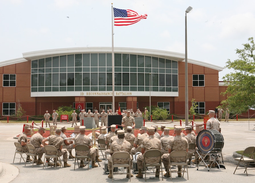 The 2nd Marine Division Band prepares to play the national anthem during the rededication ceremony, May 13, 2011. The monument honors the Marines of Force Reconnaissance Company who have paid the ultimate sacrifice over the past 50 years.