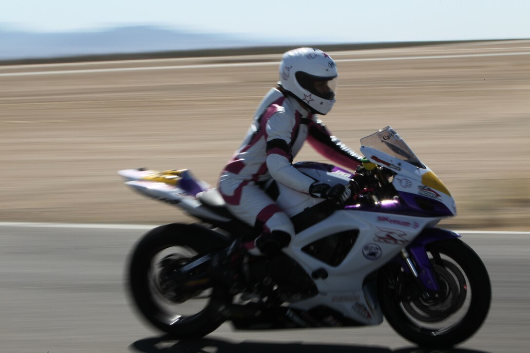 A rider hits the throttle at the strait away on the Chuckwalla Valley Raceway, during a Jason Pridmore’s Star School class sponsored by the Combat Center’s Base Safety May 13, 2011.