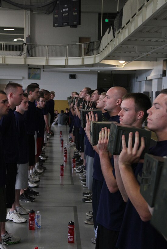 Recruiting Station Indianapolis, Ind., enlistees prepare to execute ammunition can lifts as part of the State Wide, May 14, 2011. The State Wide is a annual competition between the sub-stations of RS Indianapolis.