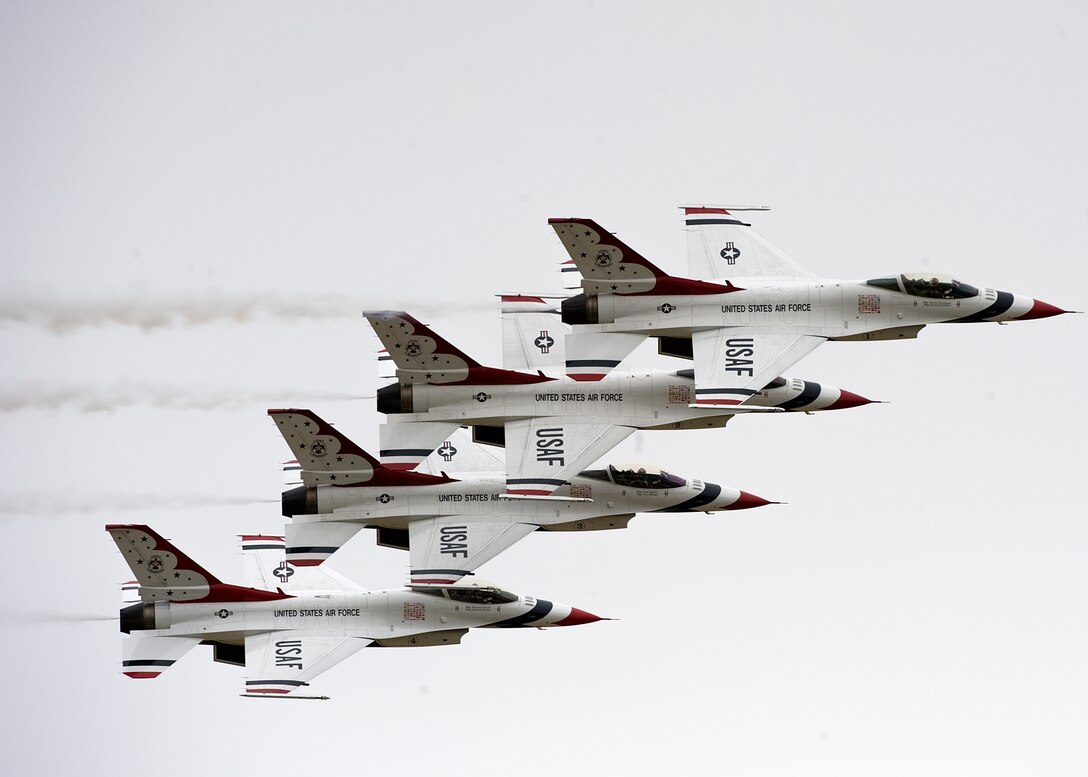 The U.S. Air Force Air Demonstration Squadron, Thunderbirds, fly in formation during the "Airpower over Hampton Roads" Open House at Langley Air Force Base, Va., May 13, 2011.   The Thunderbirds headlined Joint Base Langley-Eustis’s open house and performed precision aerial maneuvers, demonstrating the capabilities of high performance aircraft to the Hampton Roads area.  (U.S. Air Force photo/Senior Airman Zachary Wolf)(RELEASED)