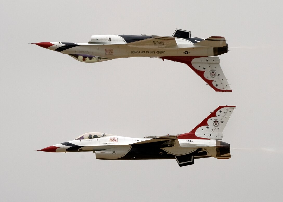 The U.S. Air Force Air Demonstration Squadron, Thunderbirds, perform during the "Airpower over Hampton Roads" Open House at Langley Air Force Base, Va., May 13, 2011. The Thunderbirds headlined Joint Base Langley-Eustis’s open house and performed precision aerial maneuvers, demonstrating the capabilities of high performance aircraft to the Hampton Roads area. (U.S. Air Force photo/Senior Airman Zachary Wolf)(RELEASED)