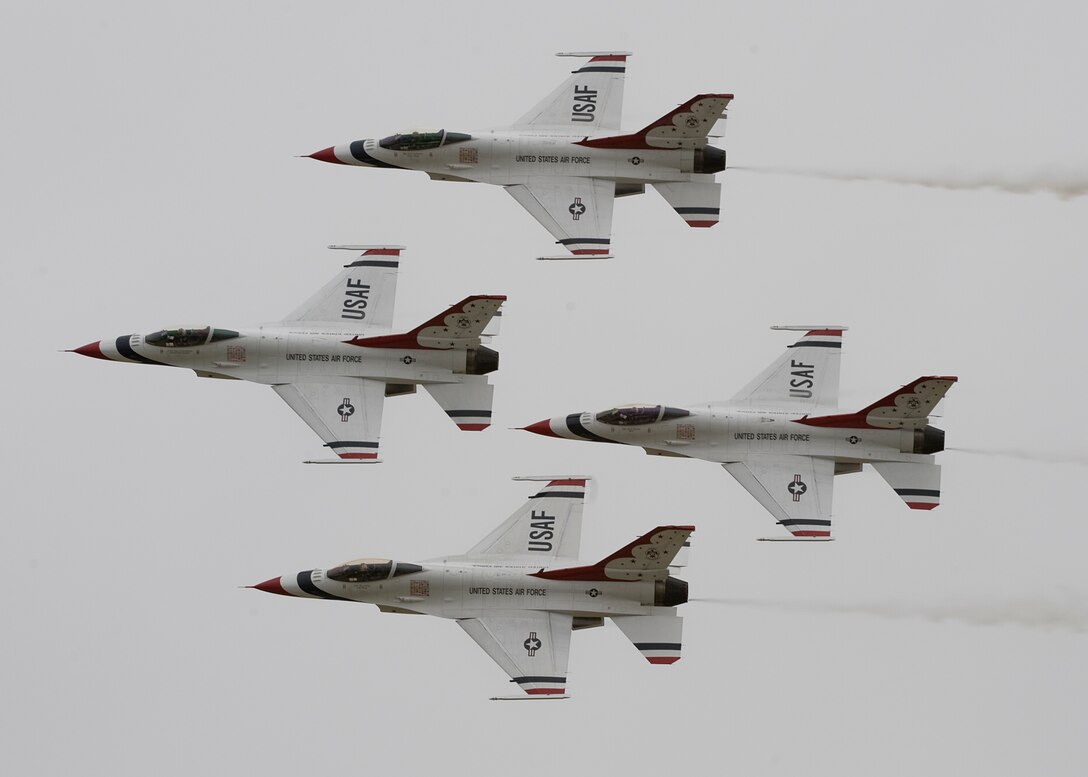 The U.S. Air Force Air Demonstration Squadron, Thunderbirds, fly in formation during the "Airpower over Hampton Roads" Open House at Langley Air Force Base, Va., May 13, 2011.   The Thunderbirds headlined Joint Base Langley-Eustis’s open house and performed precision aerial maneuvers, demonstrating the capabilities of high performance aircraft to the Hampton Roads area.  (U.S. Air Force photo/Senior Airman Zachary Wolf)(RELEASED)