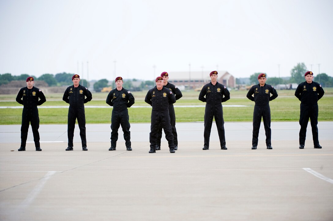 Members of the U.S. Army Parachute Team Golden Knights stand at parade rest after their jump during the "Airpower over Hampton Roads" Open House at Langley Air Force Base, Va., May 13, 2011.   The open house helps to educate the public on past and present Air Force aerial capabilities, increase recruiting and show appreciation to the local community. (U.S. Air Force photo/Senior Airman Zachary Wolf)(RELEASED)