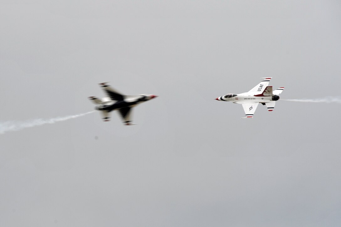 The U.S. Air Force Air Demonstration Squadron, Thunderbirds, perform precision aerial maneuvers during the “AirPower over Hampton Roads” Open House at Langley Air Force Base, Va., May 13, 2011. U.S. Air Force Thunderbirds headlined the open house, demonstrating the capabilities of high-performance aircraft to the Hampton Roads area. (U.S. Air Force photo by Airman 1st Class Camilla Griffin/RELEASED)