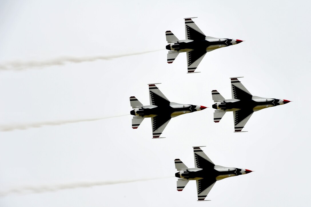 The U.S. Air Force Air Demonstration Squadron, Thunderbirds, perform precision aerial maneuvers during the “AirPower over Hampton Roads” Open House at Langley Air Force Base, Va., May 13, 2011. The Thunderbirds headlined the open house, demonstrating the capabilities of high-performance aircraft to the Hampton Roads area. (U.S. Air Force photo by Airman 1st Class Camilla Griffin/RELEASED)