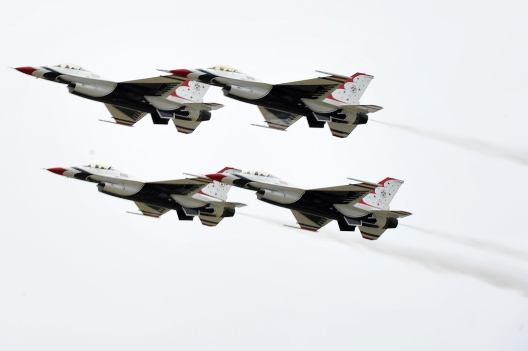 The U.S. Air Force Air Demonstration Squadron, Thunderbirds, perform precision aerial maneuvers during the “AirPower over Hampton Roads” Open House at Langley Air Force Base, Va., May 13, 2011. The Thunderbirds headlined the open house, demonstrating the capabilities of high-performance aircraft to the Hampton Roads area. (U.S. Air Force photo by Airman 1st Class Camilla Griffin/RELEASED)