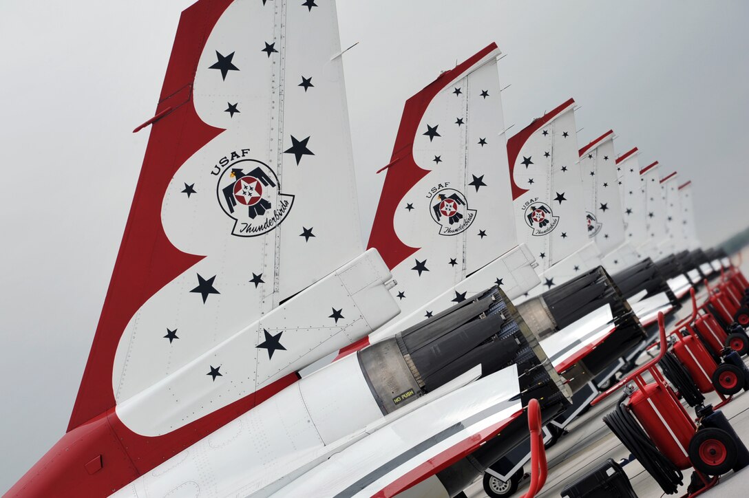 The U.S. Air Force Air Demonstration Squadron, Thunderbirds, display their trademark red, white and blue paint scheme as they rest along the flightline during the “AirPower over Hampton Roads” Open House at Langley Air Force Base, Va., May 13, 2011. The Thunderbirds headlined the open house and performed precision aerial maneuvers, demonstrating the capabilities of high-performance aircraft to the Hampton Roads area. (U.S. Air Force photo by Airman 1st Class Camilla Griffin/RELEASED)